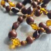 p1-177.jpg Vintage Long Flapper style Brown and Amber glass Beaded Necklace