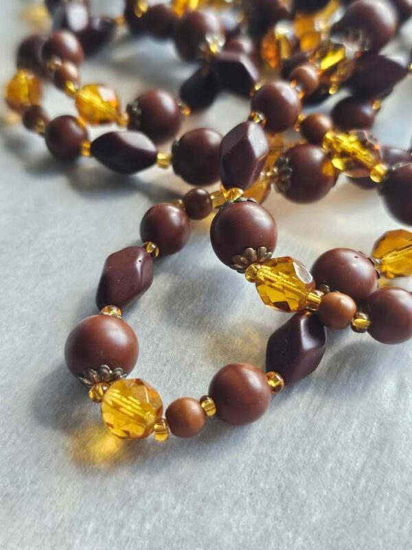 p1-177.jpg Vintage Long Flapper style Brown and Amber glass Beaded Necklace