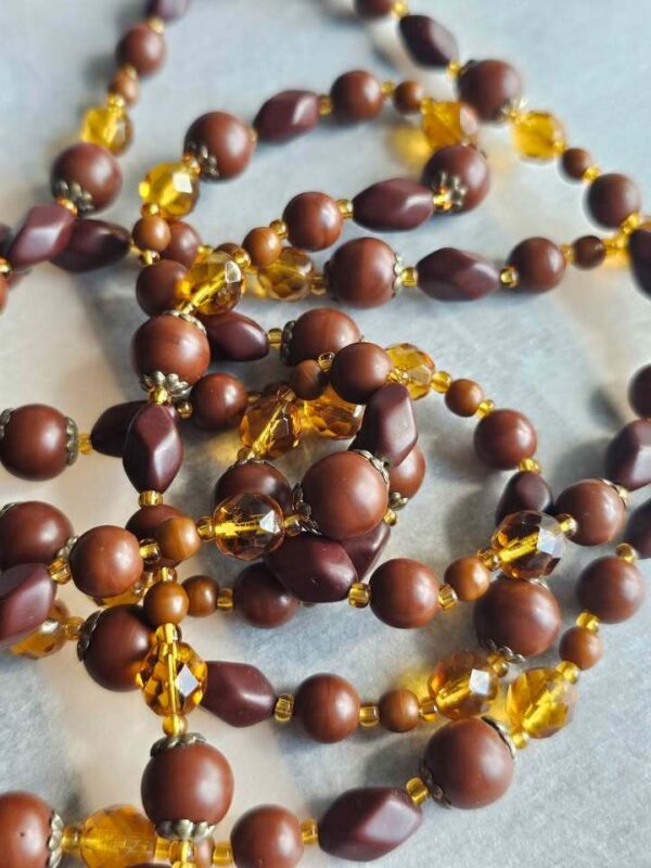 p1-179.jpg Vintage Long Flapper style Brown and Amber glass Beaded Necklace