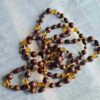 p1-180.jpg Vintage Long Flapper style Brown and Amber glass Beaded Necklace