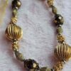 p1-223.jpg Vintage 1960s Mid Century Textured Gold Tone Ribbed & Faceted Bead Necklace