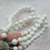 p1-592.jpg Vintage Triple Strand Milk Glass Bead Necklace unusual clasp