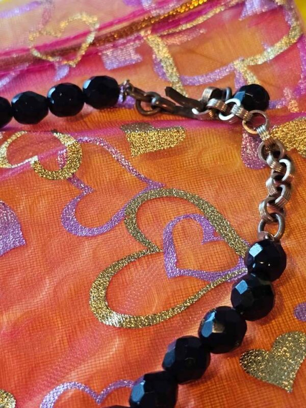 p1-652.jpg Check out the brass chain on this JET Black Vintage Faceted Bead Necklace!